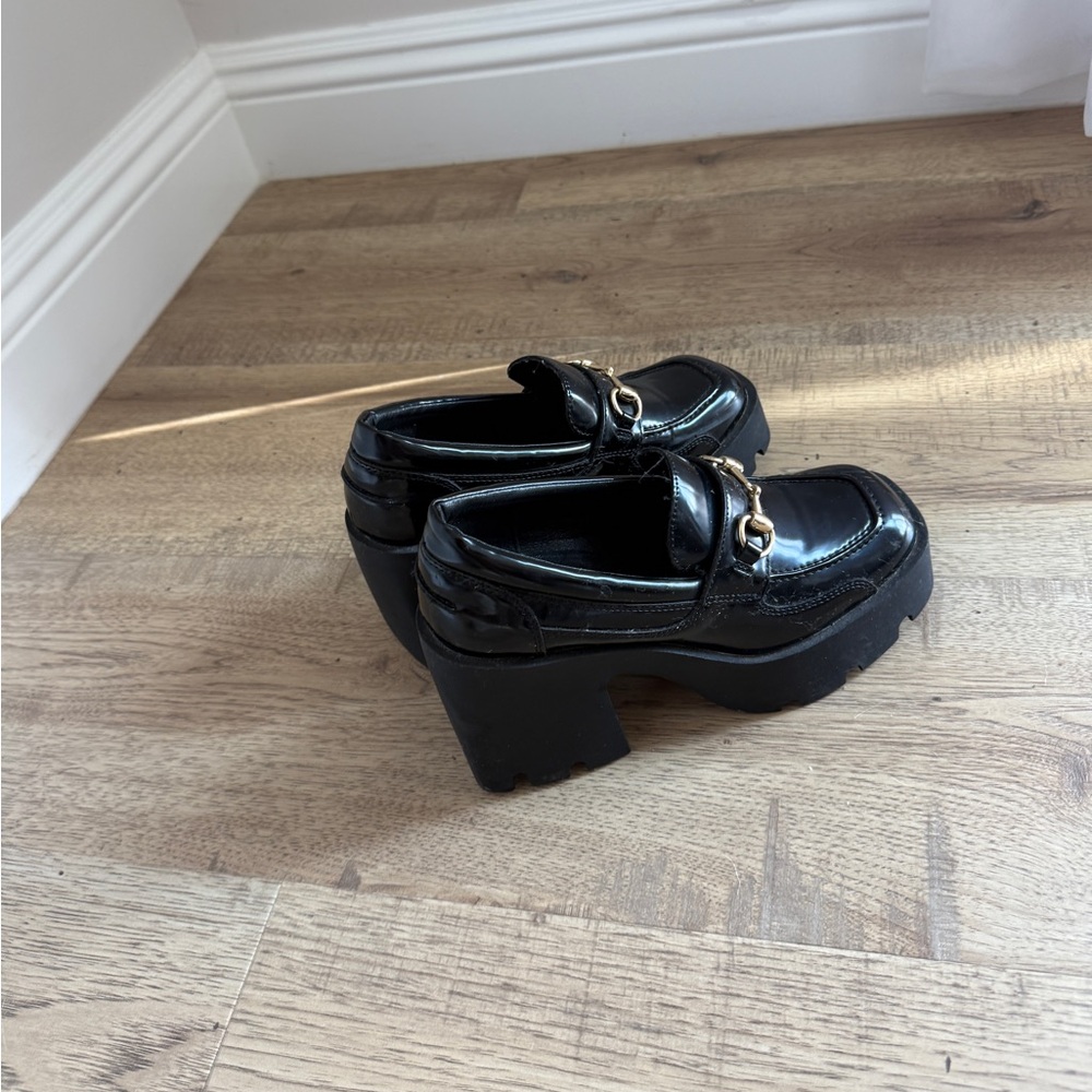 Steve Madden Black Patent Loafers with Gold Accent